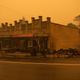 The remains of burnt out buildings are seen along main street in the New South Wales town of Cobargo on December 31, 2019, after bushfires ravaged the town.